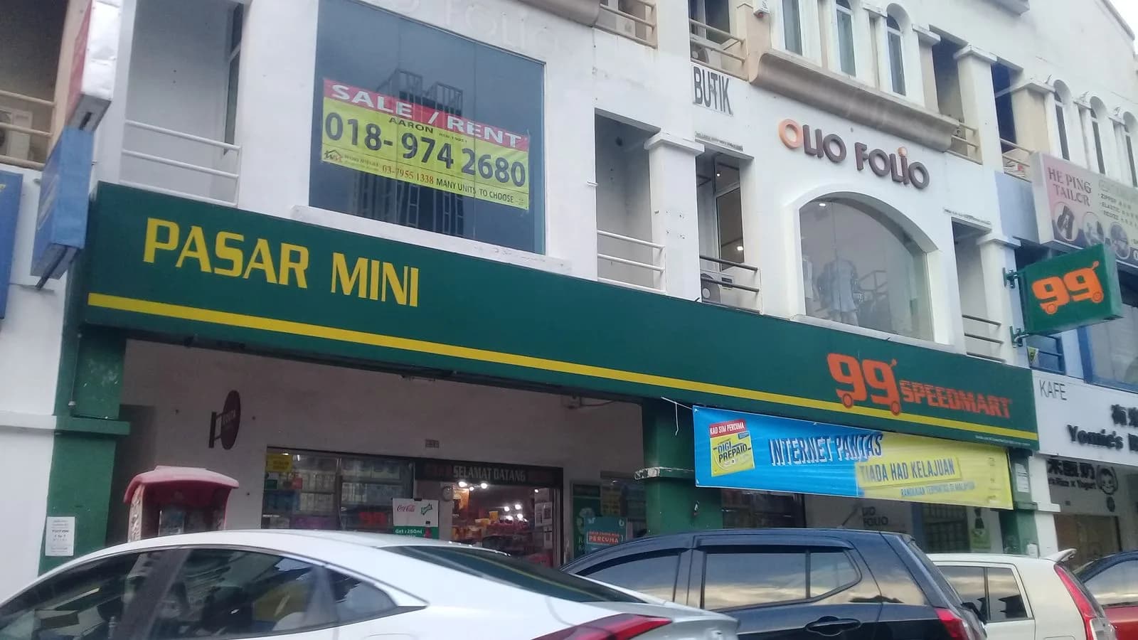 The green and yellow storefront of 99 Speedmart in Dataran Sunway, Malaysia.